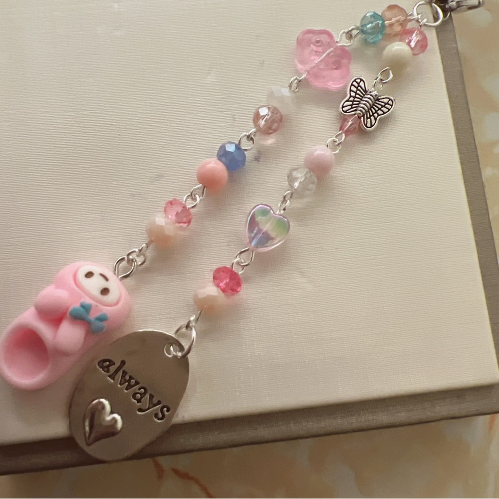 Sanrio melody phone charm